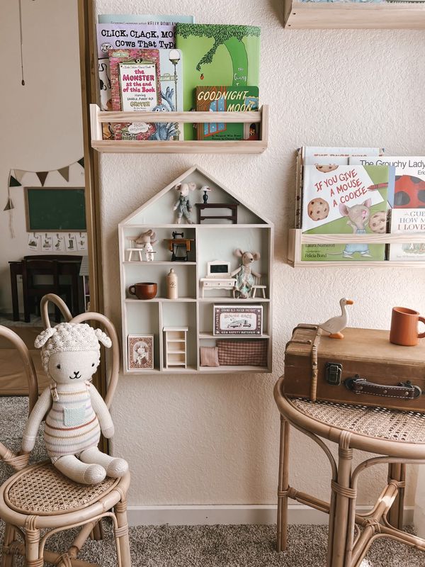 The house shaped shadow box with a Maileg display in a kid's room