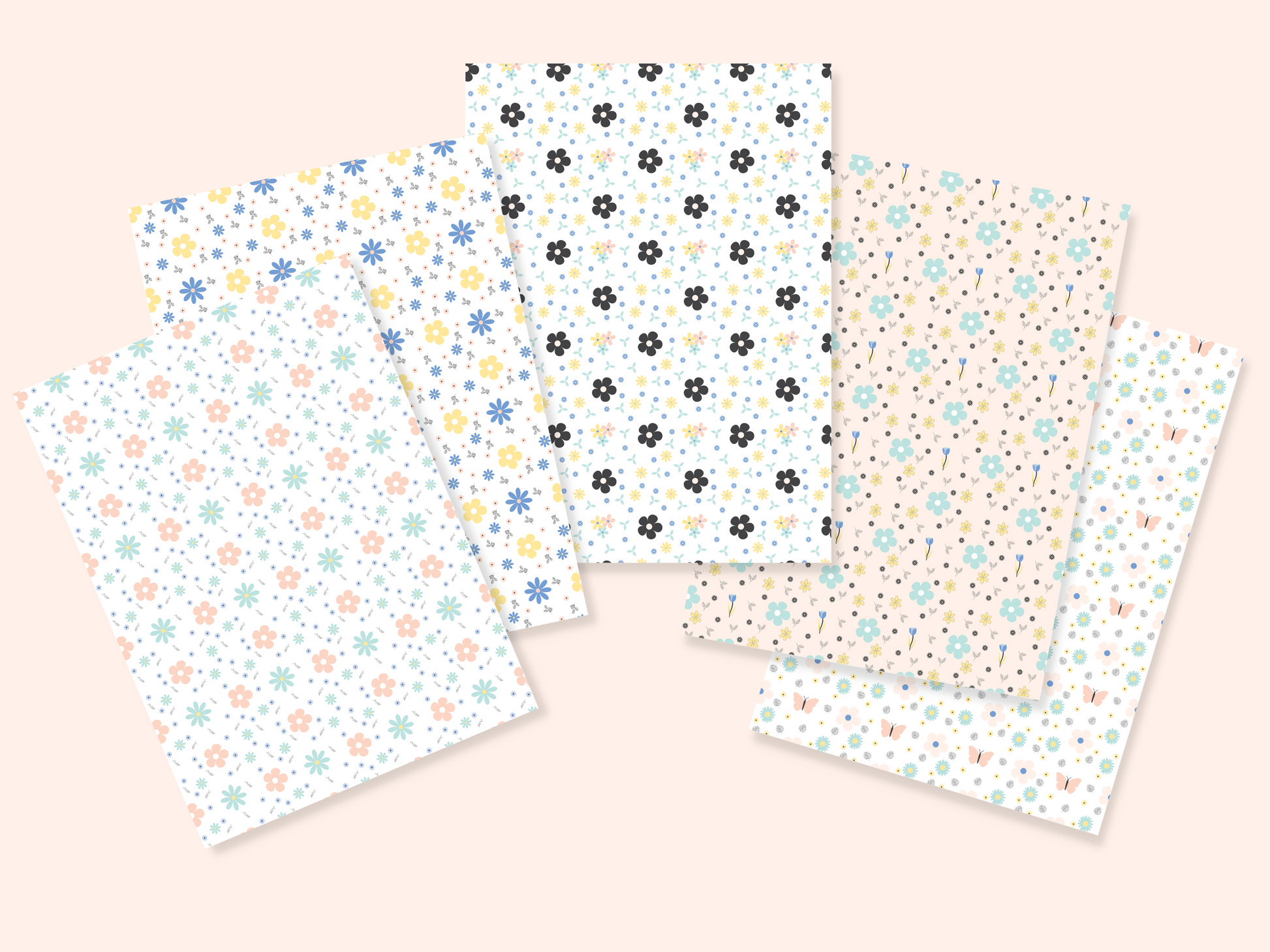 5 dollhouse wallpaper sheets with 5 different floral patterns presented in a fan shape